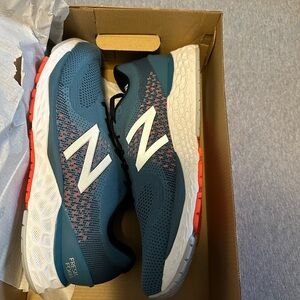 New Balance men’s 880 v 10 size 14 new in box.